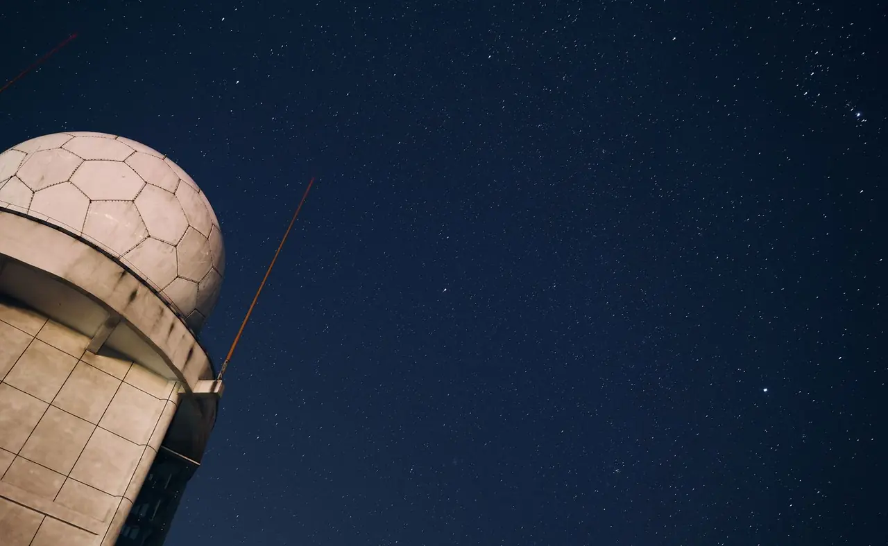 Stunning observatory dome under a starry night sky